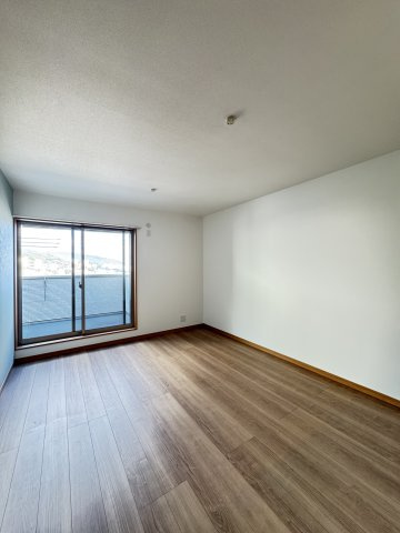 リアライズ箕岡の居間・リビング