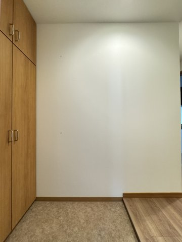 リアライズ箕岡の玄関