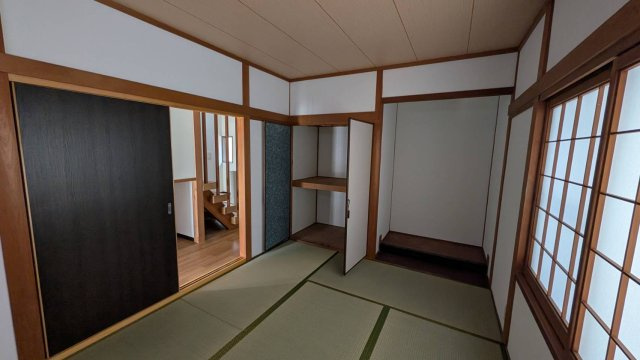 岡山市南区妹尾　ガレージ付き中古戸建の和室|１階和室：約６帖