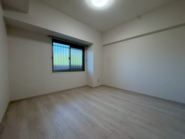 多摩市馬引沢２丁目の賃貸マンションの寝室