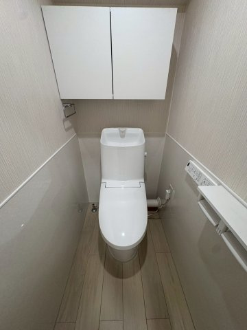 多摩市馬引沢２丁目の賃貸マンションのトイレ