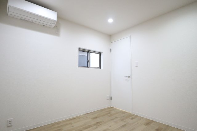 グランテラス萱島の洋室