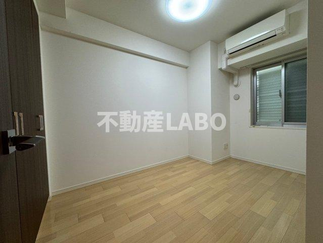 メイツブラン九条駅前の洋室