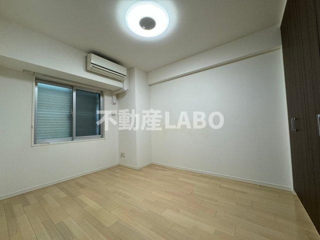 メイツブラン九条駅前の寝室