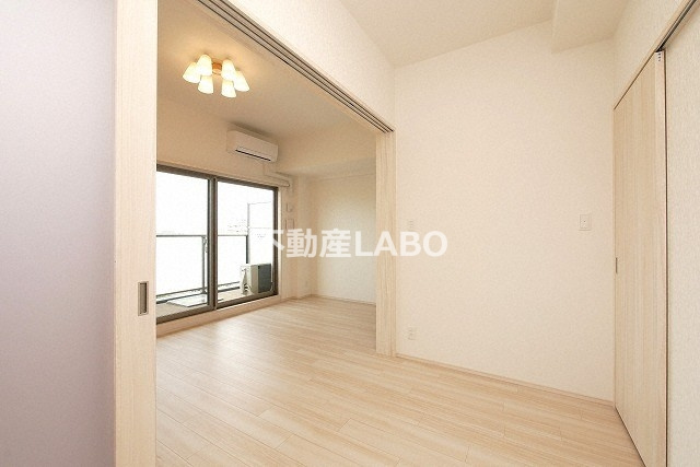 プレジオ弁天町ASIANの寝室