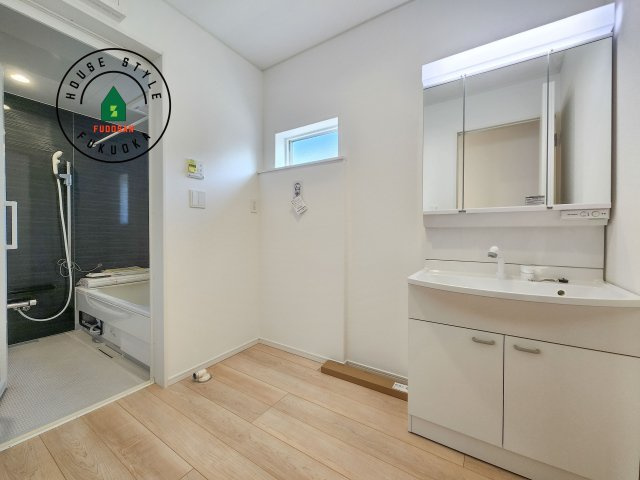 糸島市二丈深江第3-7棟（1号棟）の内観：施工例|脱衣所、洗面所は小さなプライベートスペース。歯磨き、洗顔と毎日施す個人空間。