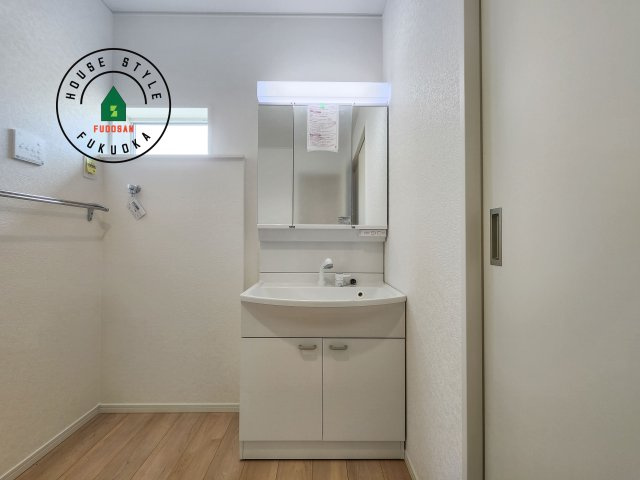 福岡市西区今宿1丁目第4-2棟（1号棟）の内観：施工例|洗面所は小さなプライベートスペース。歯磨き、洗顔と毎日施す個人空間。