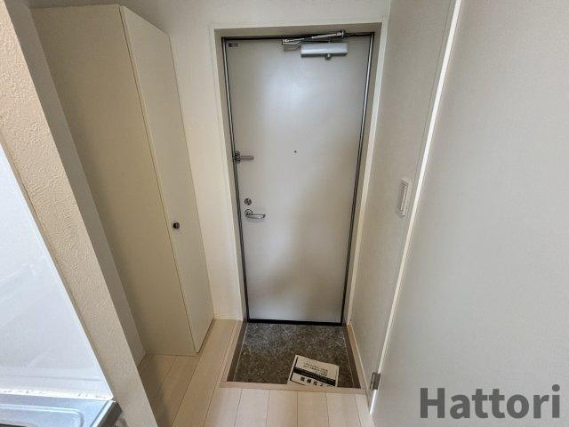 エス・ルミエールの玄関