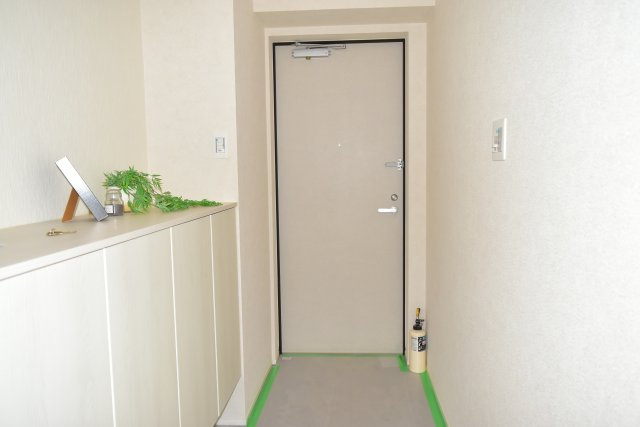 青梅市河辺町１丁目の中古マンションの玄関