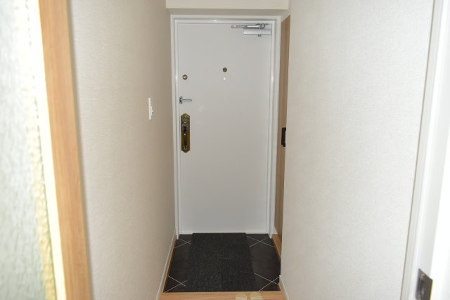 多摩市豊ヶ丘１丁目の中古マンションの玄関