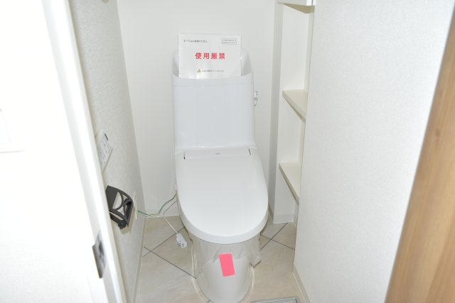 多摩市豊ヶ丘１丁目の中古マンションのトイレ