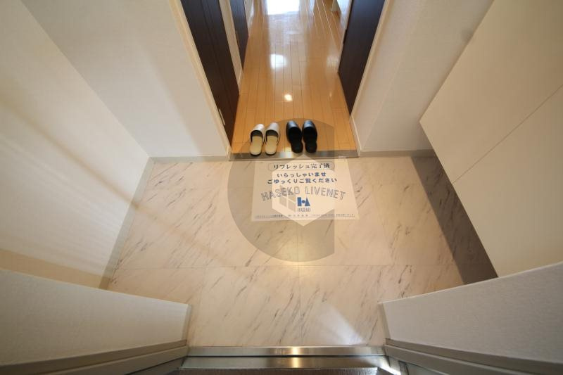 CASSIA高井田SouthCourtの玄関