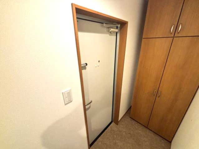 リアライズ箕岡の玄関