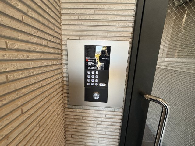 リアライズ箕岡の玄関