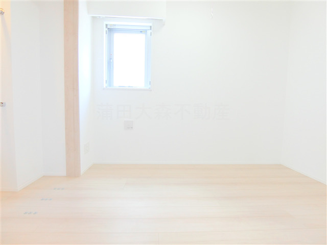 グランカーサ蒲田ウエストのその他|洋室5.7帖　ウォークインクローゼットと室内物干し付の寝室