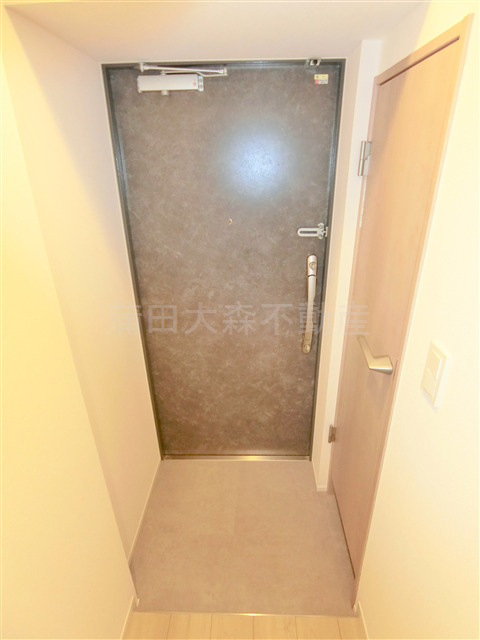 グランカーサ蒲田ウエストの玄関