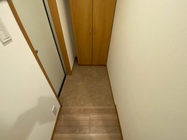 リアライズ箕岡の玄関