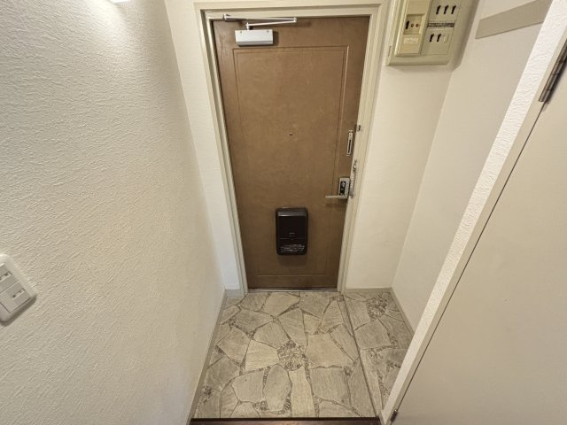 ロイヤルコーポ忠岡の玄関