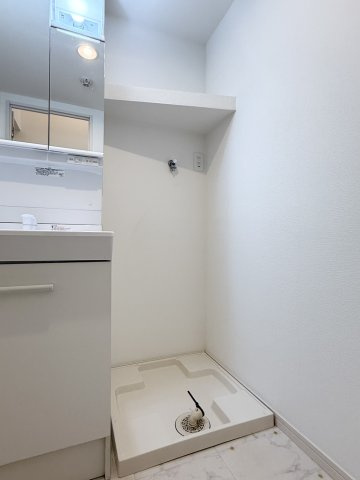 MAISON SOLEILのバルコニー|室内の洗濯機置き場