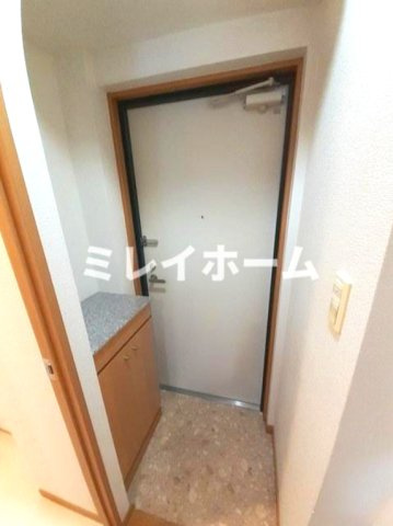 プレジール　シナガワの玄関