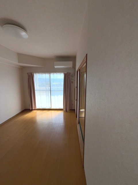 サンライズマンション岩出Ⅴ弐番館の居間・リビング