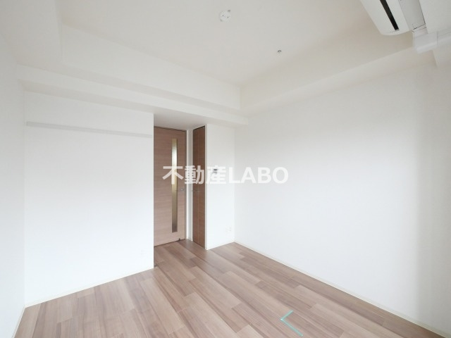 プレサンス玉造駅前ルージュの洋室