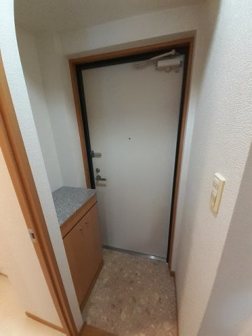 プレジール　シナガワの玄関