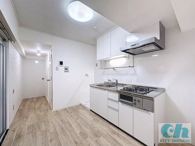 育進ビル 302号室の洋室