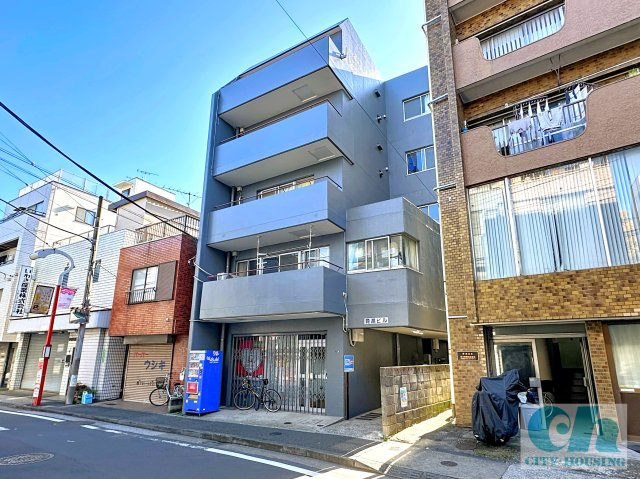 育進ビル 302号室の外観