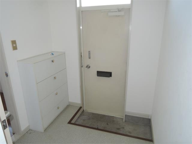 川崎市多摩区菅北浦１丁目のアパートの玄関