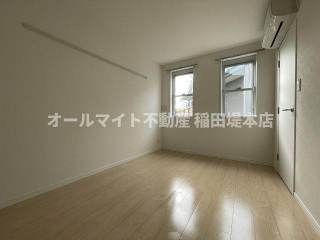 多摩市東寺方１丁目の賃貸マンションの寝室