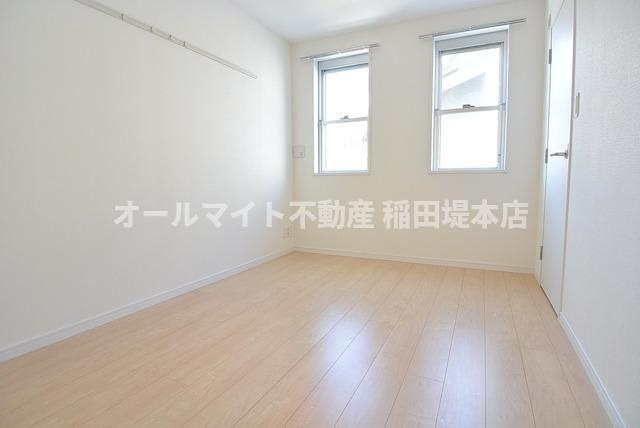 多摩市東寺方１丁目の賃貸マンションの洋室