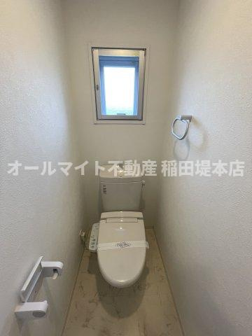 多摩市東寺方１丁目の賃貸マンションのトイレ