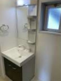 多摩市東寺方１丁目の賃貸マンションの洗面所