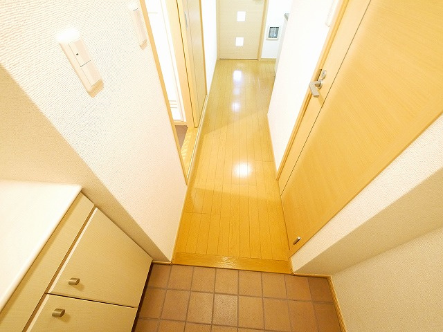 サンシャイン　富雄駅前の玄関