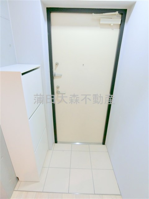 レジデンス平和島の玄関