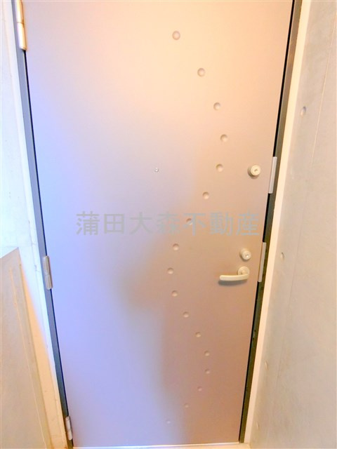 レジデンス平和島の玄関