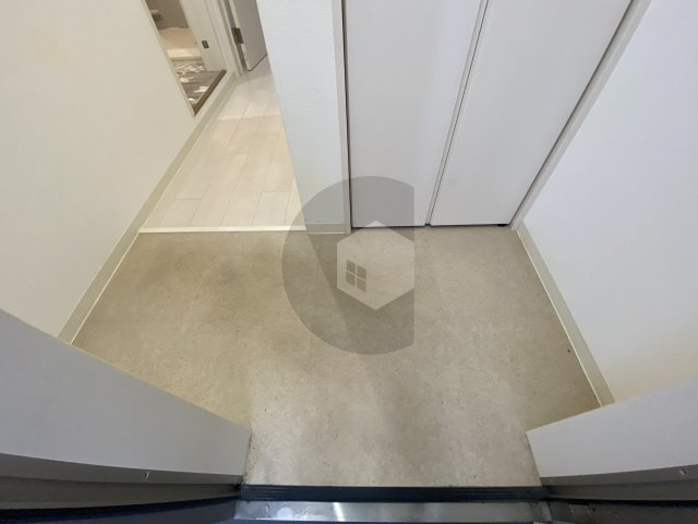 クリエオーレ鴻池徳庵町の玄関