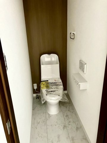 丸亀市土器町西　シックなデザインの平屋戸建住宅のトイレ