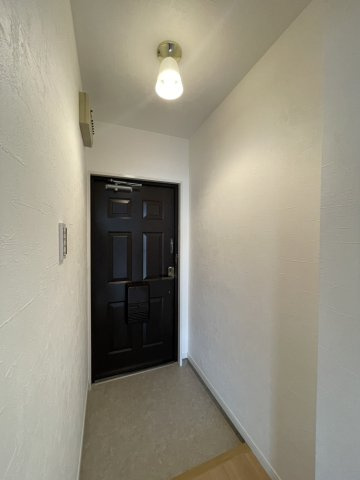 コンドミニアムカワムラの玄関