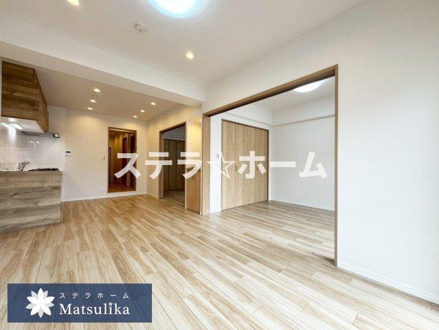 メロディーハイム吹田青葉丘の居間・リビング|ゆったりとした居間です