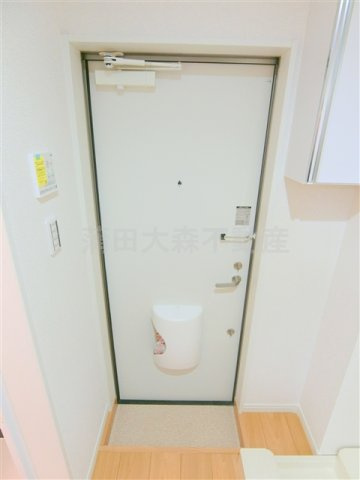 ウェルシー蒲田の玄関