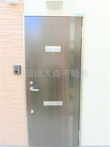 ウェルシー蒲田の玄関