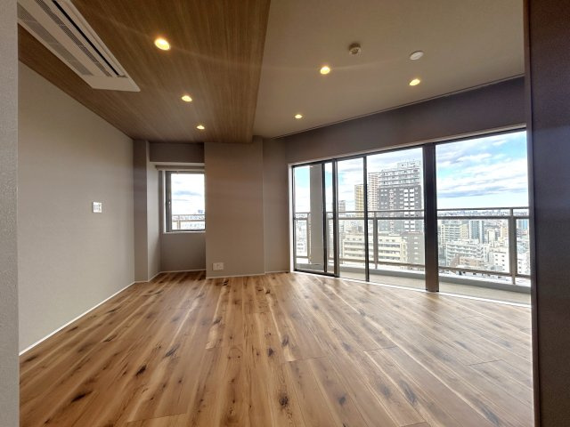 リーデンスタワーの居間・リビング|リビングは家族が1番くつろげる癒しの空間、家族が集い憩うリビングスペースはナチュラルカラーの明るい心地良い空間に仕上がりました。