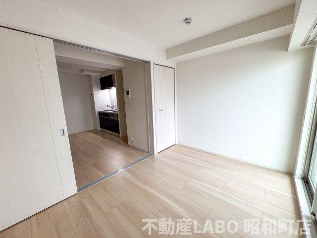 リアライズ今里南の寝室