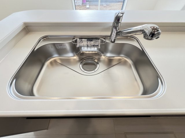 桜井市大福 １号棟 のキッチン|清潔感あるステンレスシンク