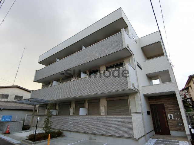 アヴェニール千里丘東の外観