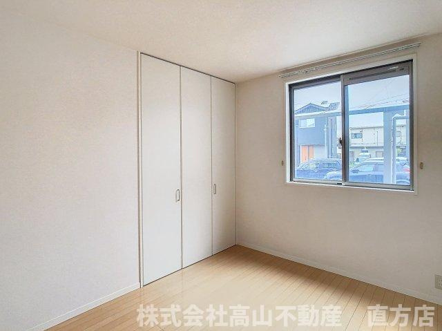 ソレイユたかみねの里の洋室