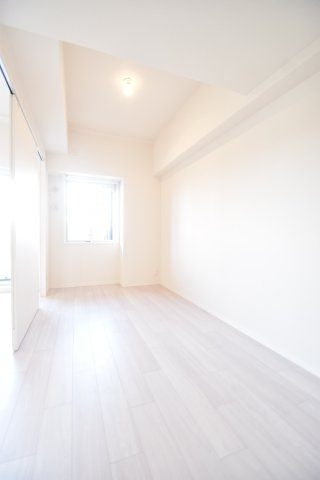 大阪市城東区新喜多１丁目の賃貸マンションの寝室