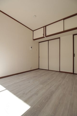【洋室】 | マンションみどり | 落ち着いた色調の寝室です